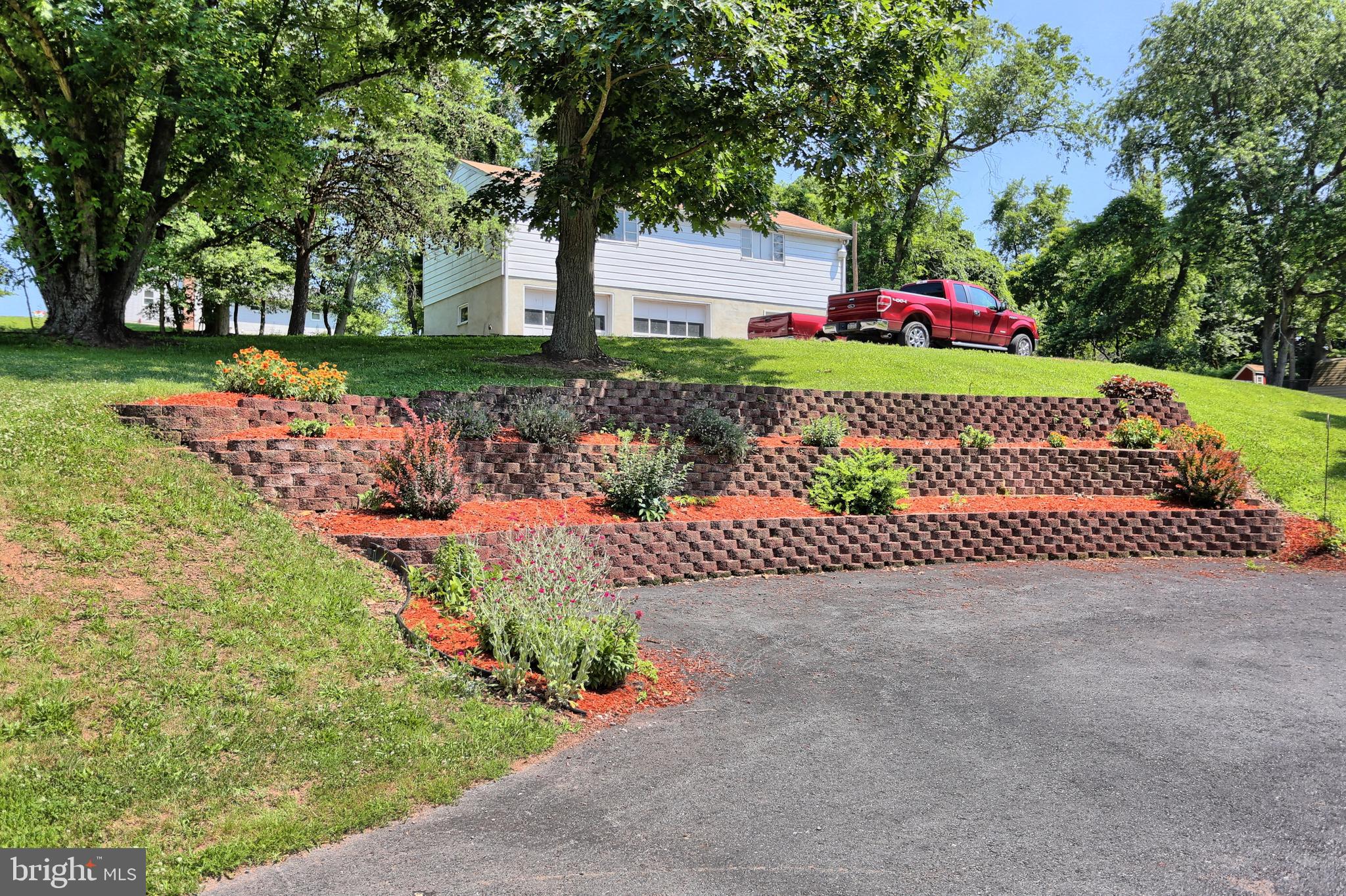 76 Community Road Newport, PA 17074 - Photo 3 of 50 Landscaped Bed by the Driveway
