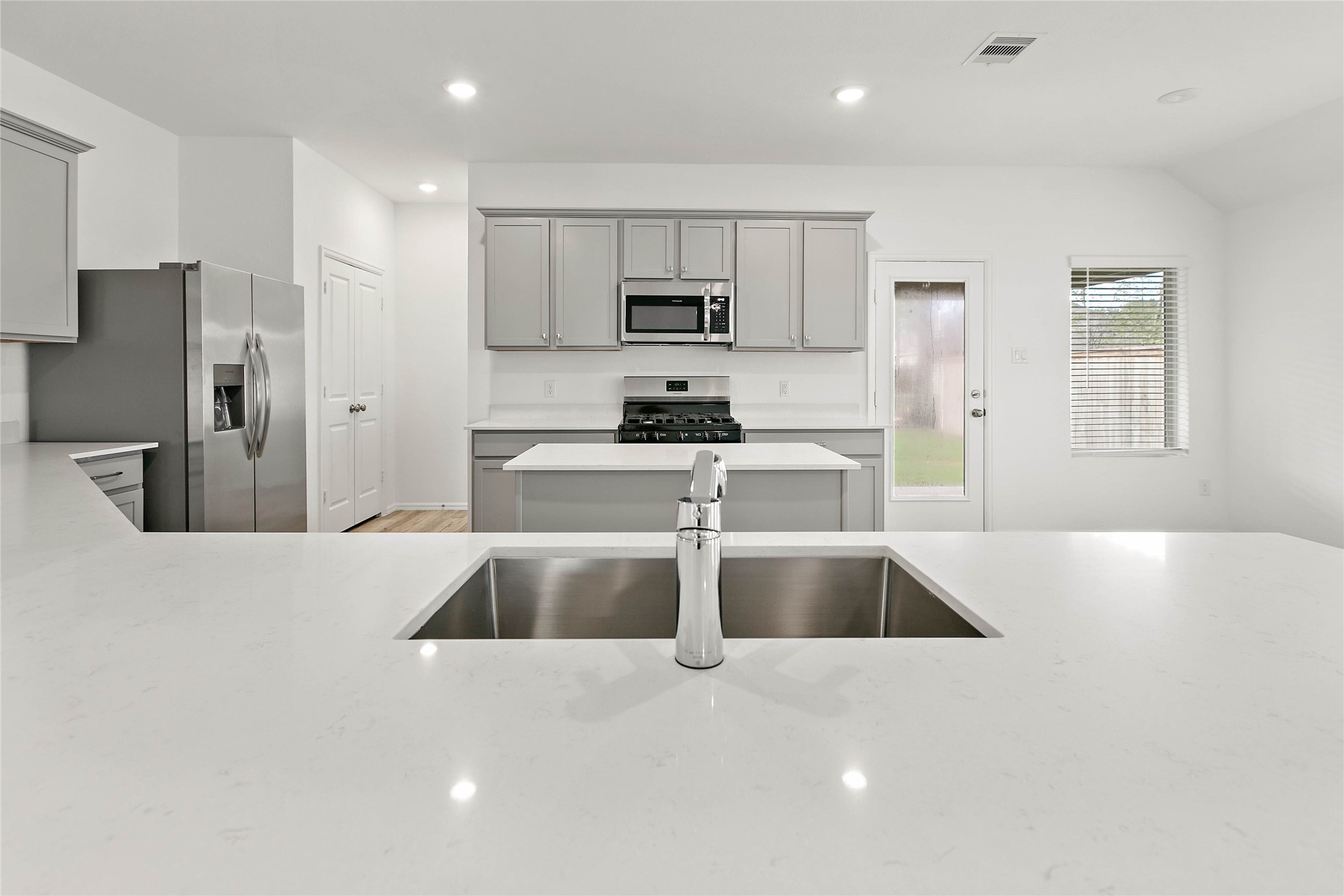 7602 Angels Lndg Lane Porter, TX 77365 - Photo 8 of 32 The heart of the home: stunning island kitchen.