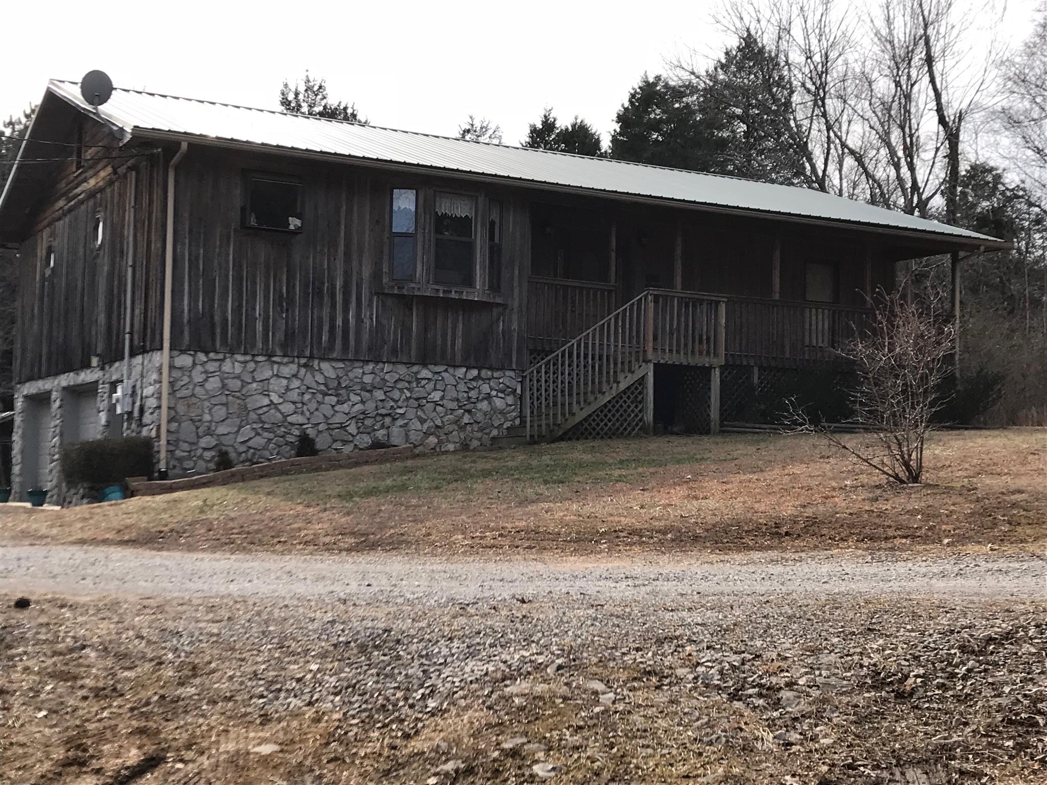 571 Grindstone Hollow Road Dickson, TN 37055 - Photo 1 of 23 Western Cedar and Stone Exterior with Metal Roof