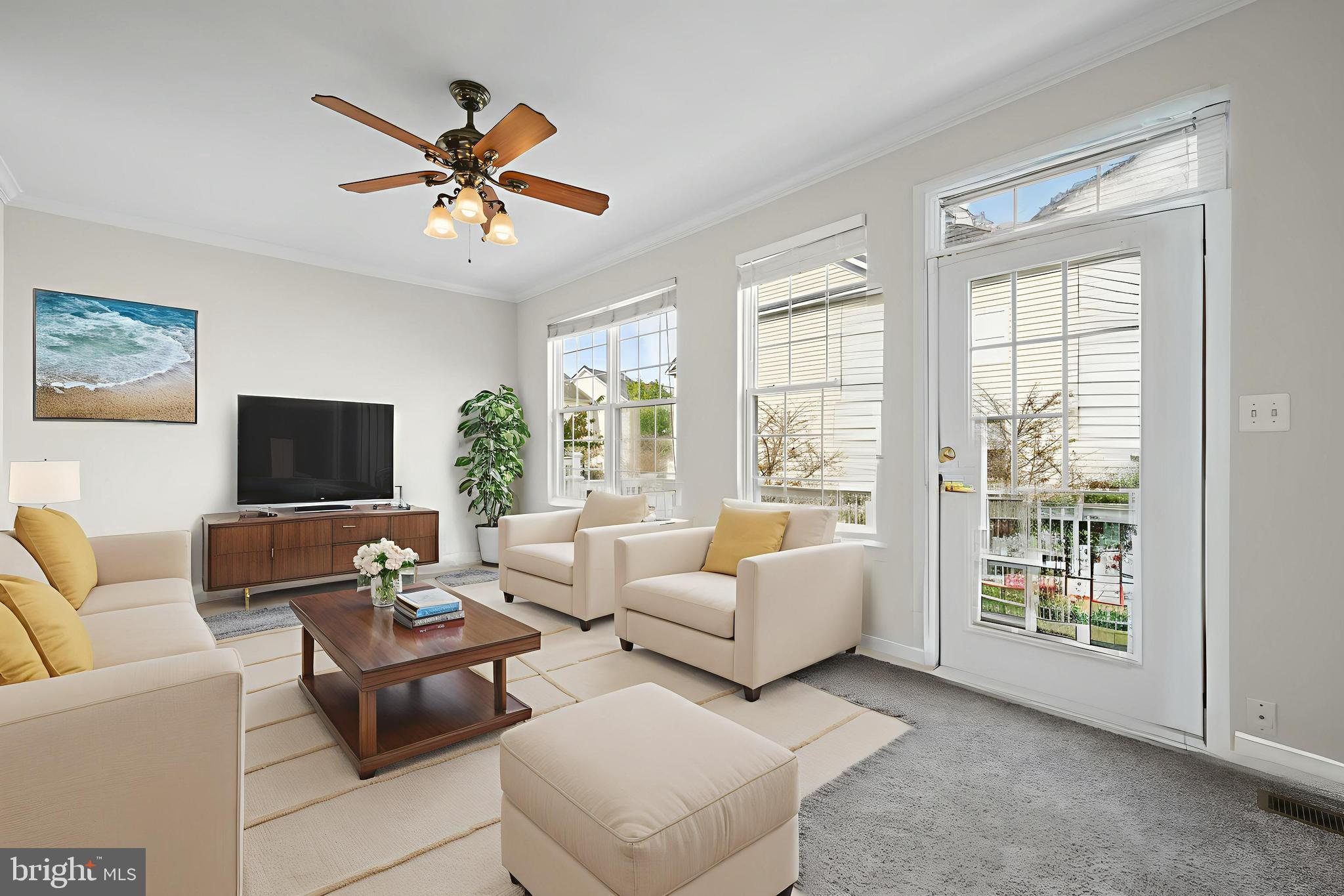 5564 Lanier Avenue Suitland, MD 20746 - Photo 2 of 37 a living room with furniture and a flat screen tv