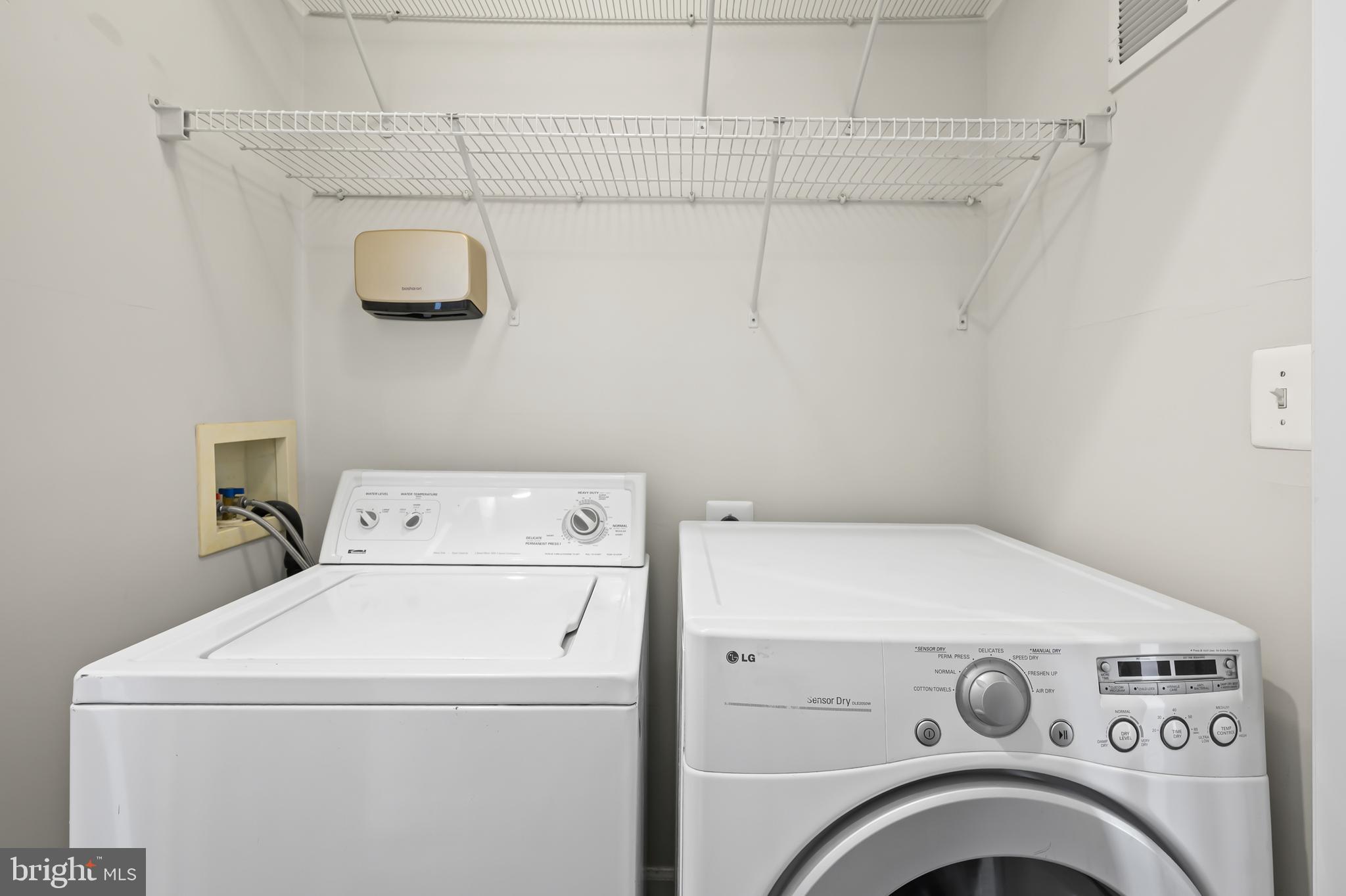 5564 Lanier Avenue Suitland, MD 20746 - Photo 23 of 37 a utility room with dryer and washer