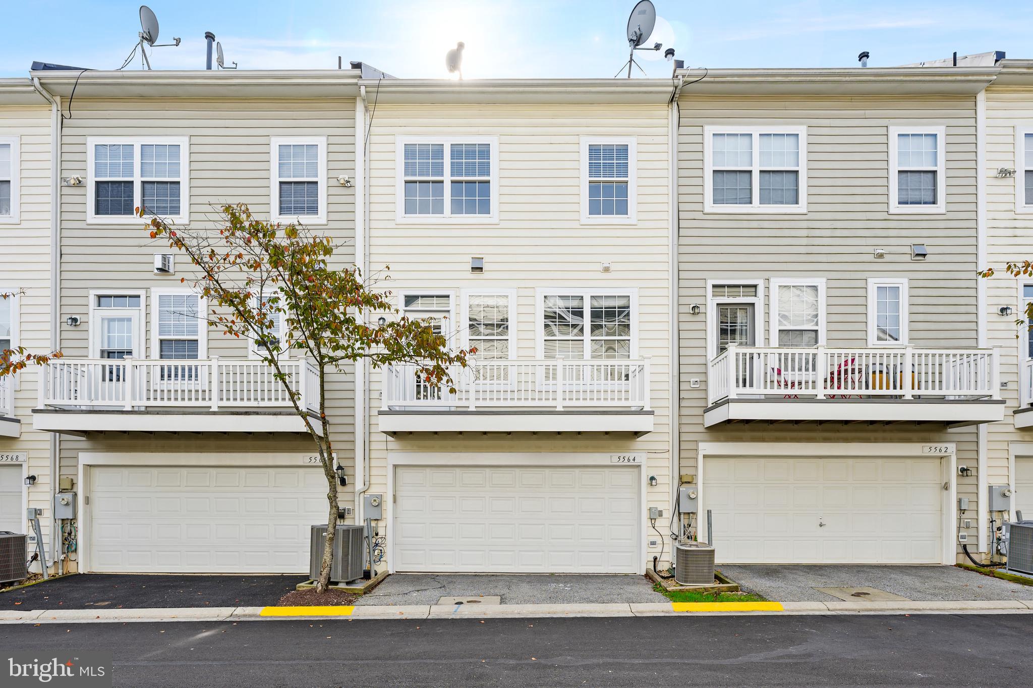 5564 Lanier Avenue Suitland, MD 20746 - Photo 36 of 37 a front view of a house with a garage
