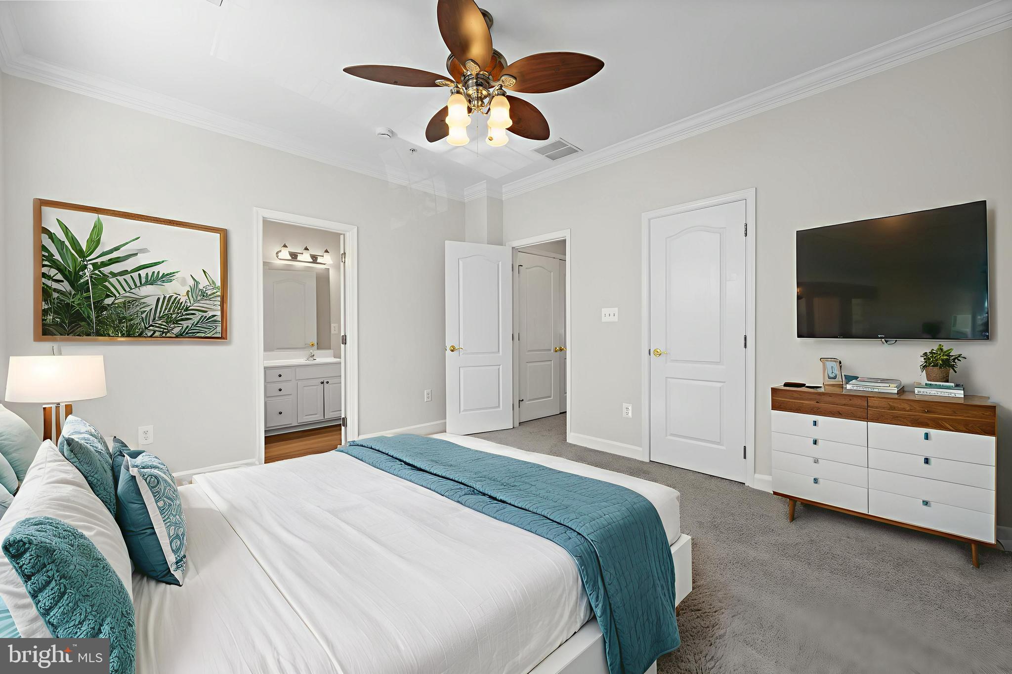 5564 Lanier Avenue Suitland, MD 20746 - Photo 5 of 37 a bedroom with a bed and a flat screen tv