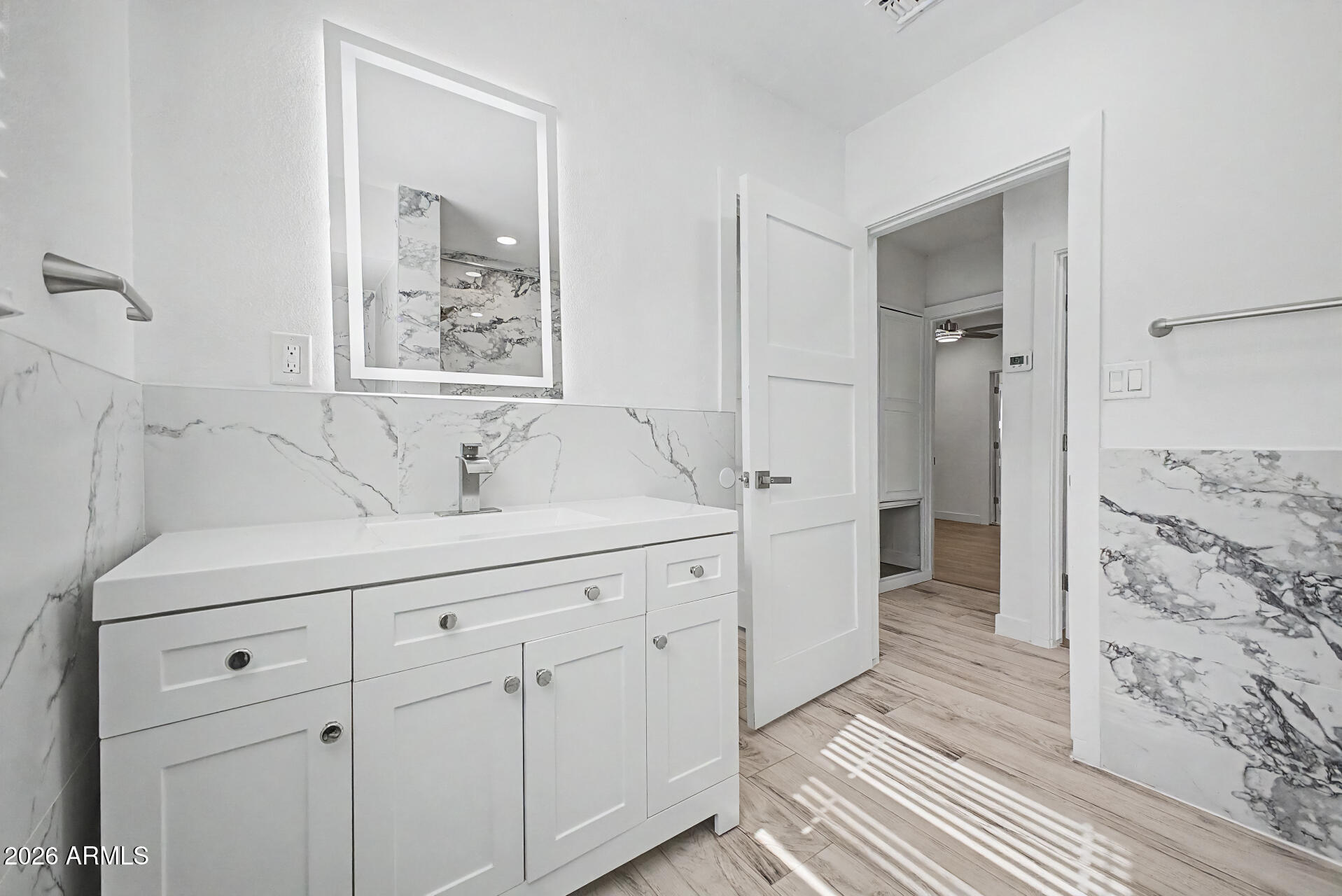 532 East Cheery Lynn Road Phoenix, AZ 85014 - Photo 20 of 37 a spacious bathroom with double vanity sink a mirror and shower