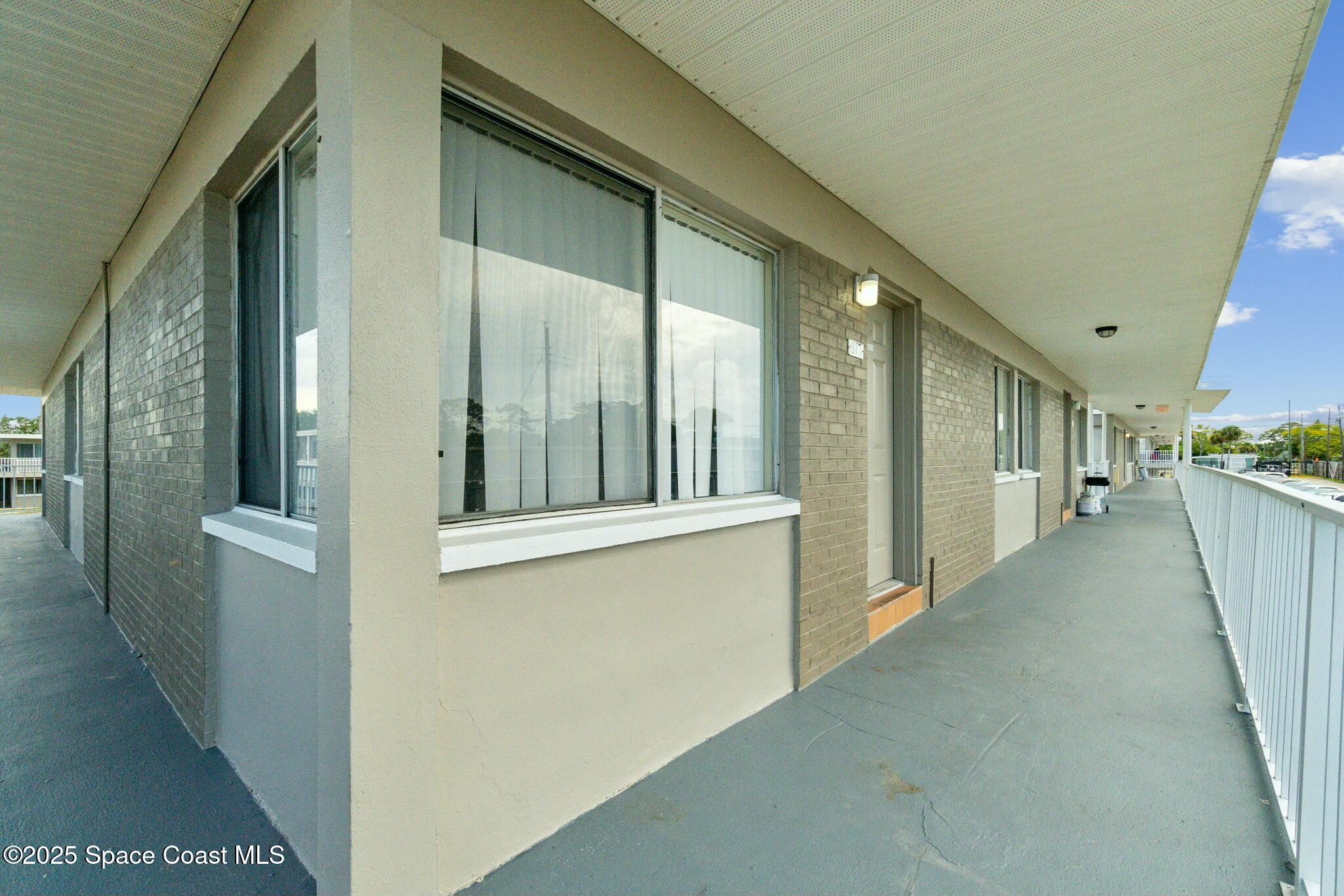 800 North Fiske Boulevard, Unit 513 Cocoa, FL 32922 - Photo 3 of 21 a view of a hallway with seating area