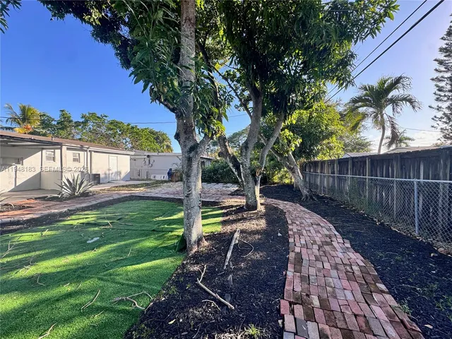 a view of a garden with a slide