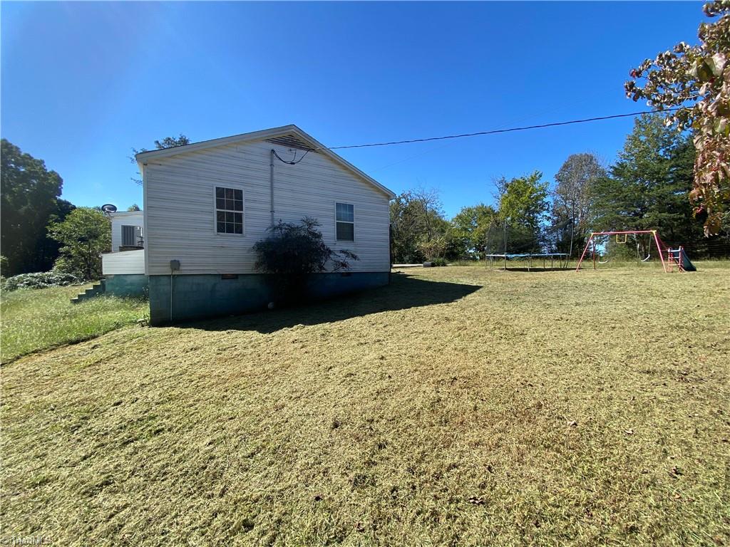 5644 Allison Road Pelham, NC 27311 - Photo 10 of 12 Side yard view toward front yard
