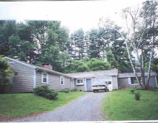 16 Hilltop Road Sharon, CT 06069 - Photo 1 of 1 a aerial view of a house next to a big yard and large trees