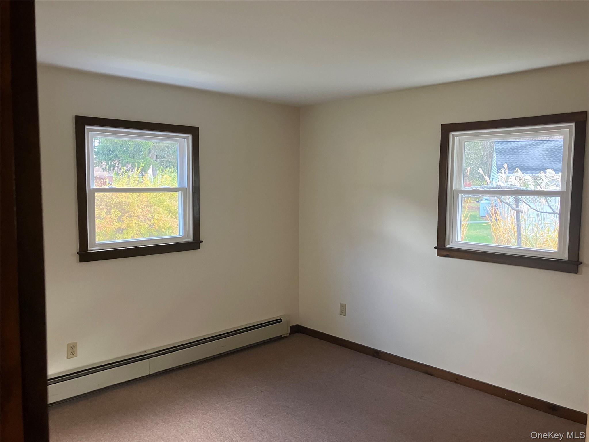 48 Jefferson Road Red Hook, NY 12571 - Photo 12 of 15 an empty room with a window