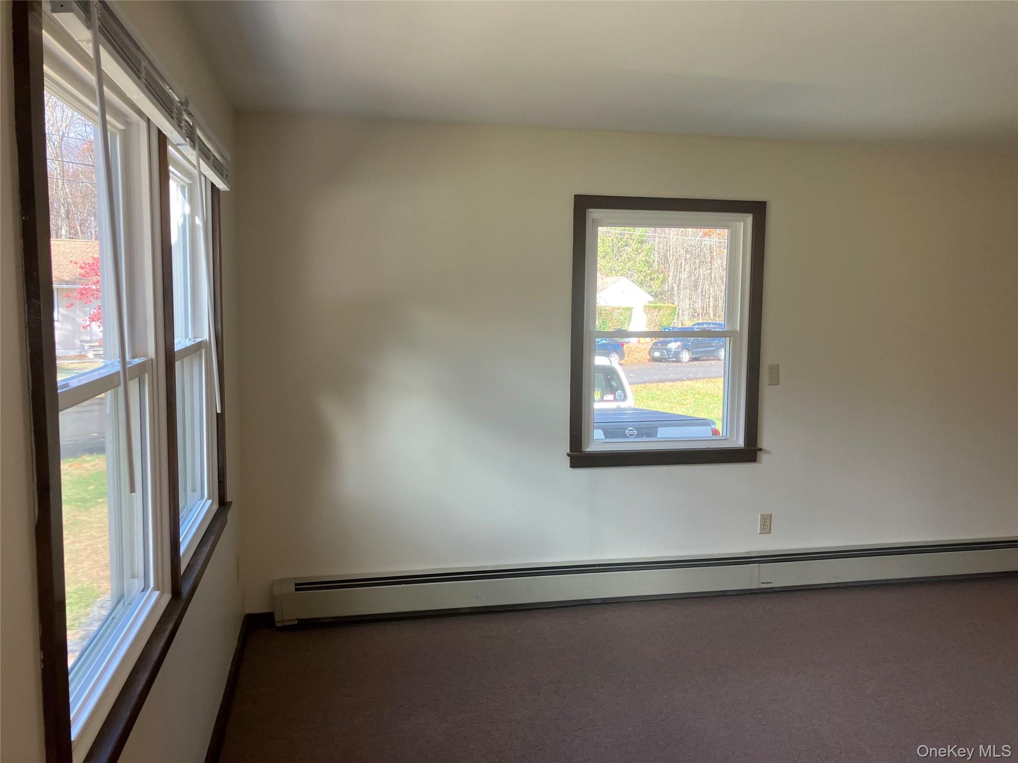 48 Jefferson Road Red Hook, NY 12571 - Photo 7 of 15 a view of an empty room with a window