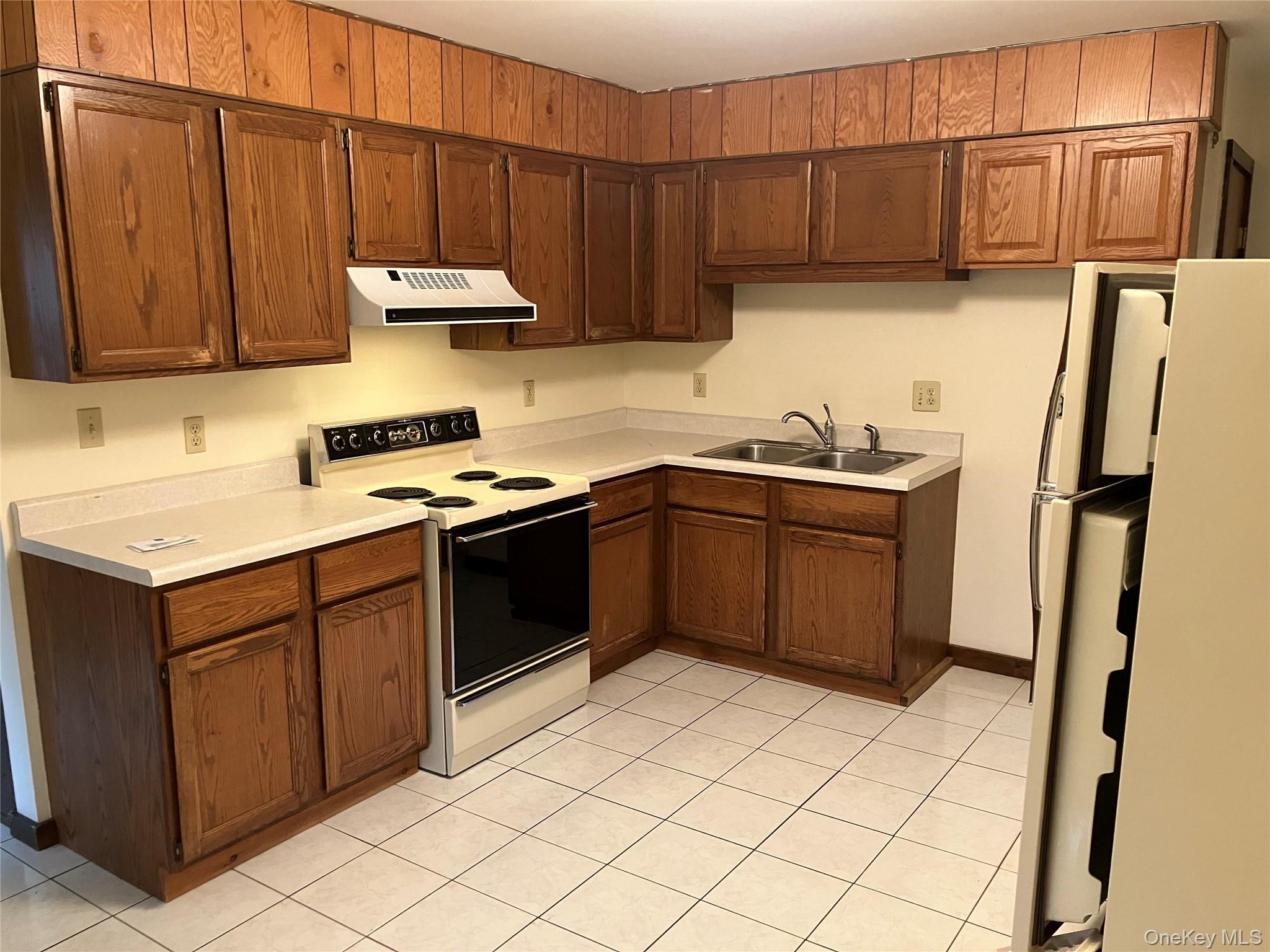 48 Jefferson Road Red Hook, NY 12571 - Photo 10 of 15 a kitchen with stainless steel appliances granite countertop a sink stove and refrigerator