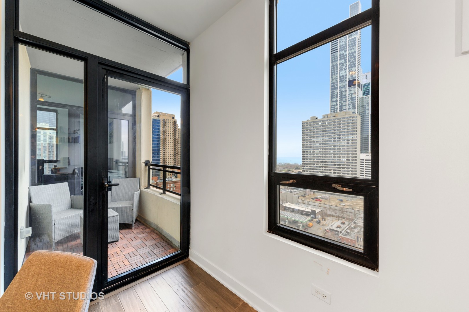 1255 South State Street, Unit 1603 Chicago, IL 60605 - Photo 11 of 21 a picture of a living room with a mirror
