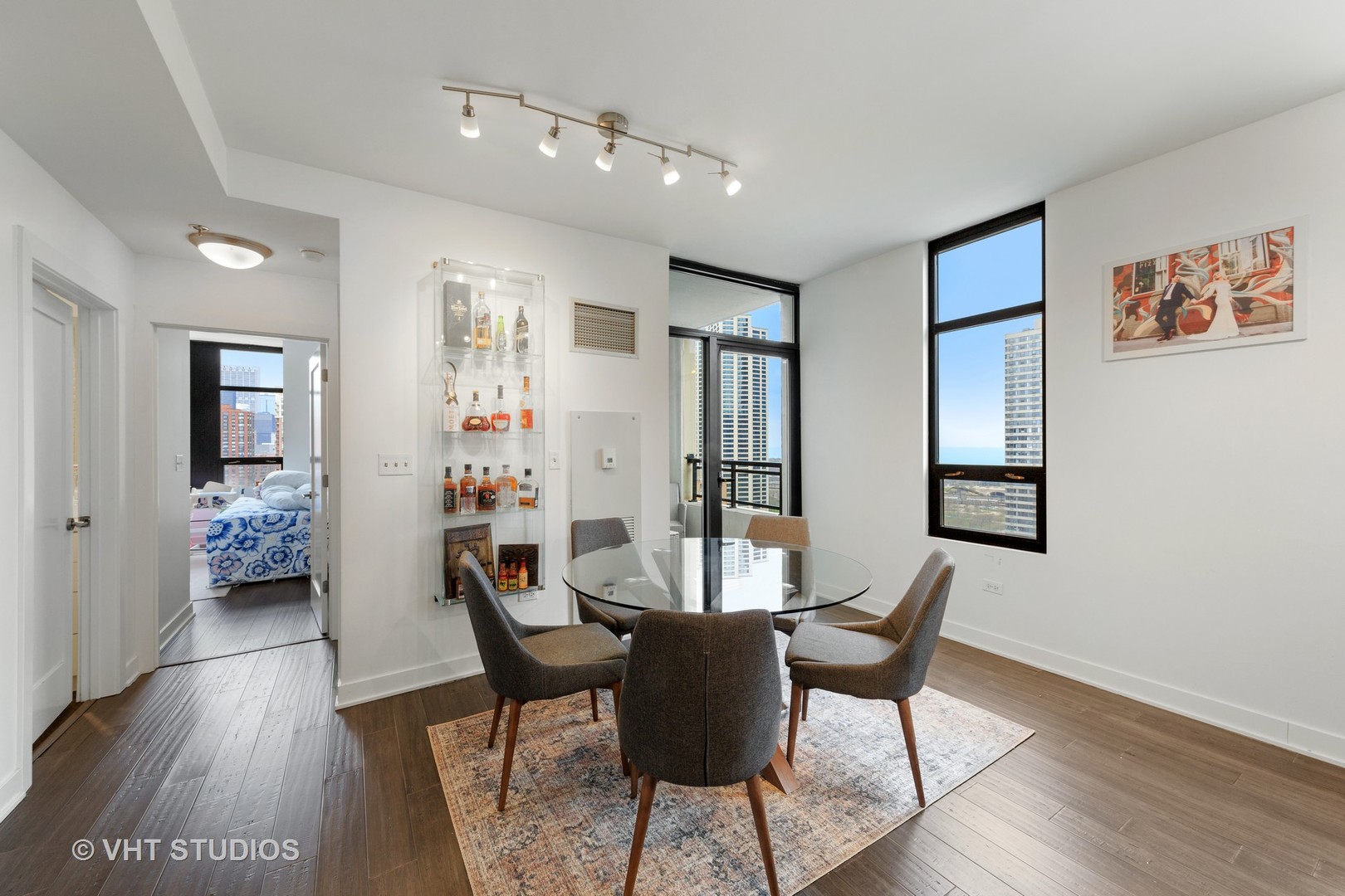 1255 South State Street, Unit 1603 Chicago, IL 60605 - Photo 12 of 21 a view of a livingroom with furniture and wooden floor