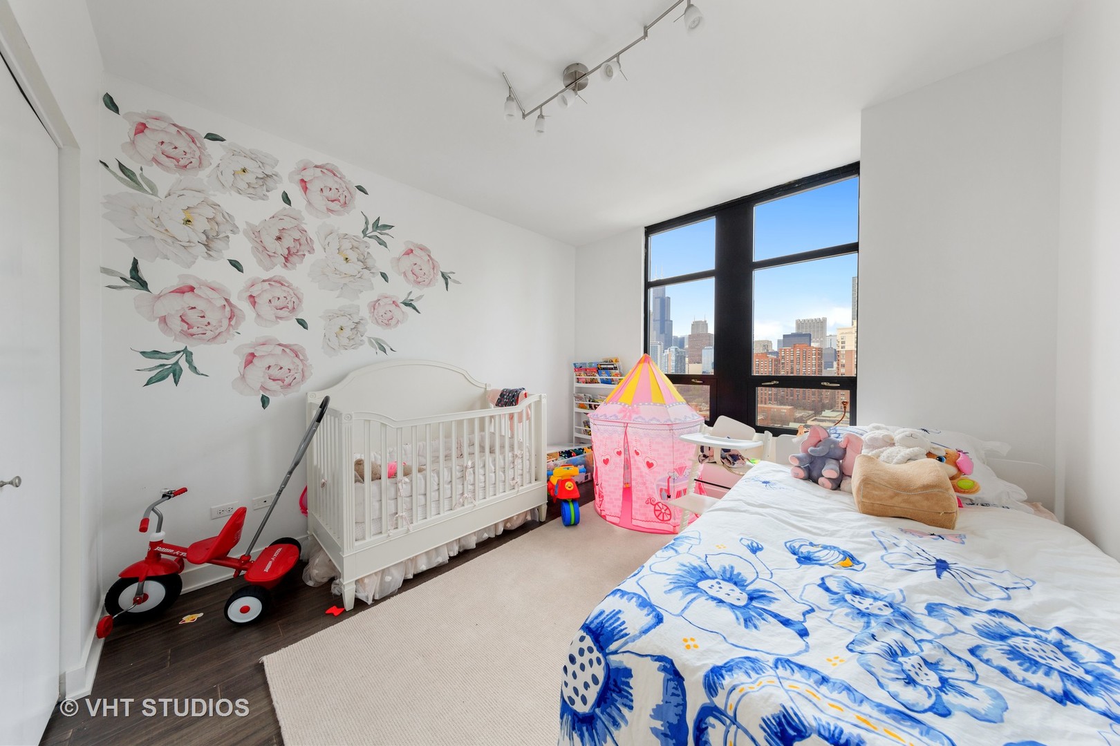 1255 South State Street, Unit 1603 Chicago, IL 60605 - Photo 16 of 21 a bedroom with bed and a window
