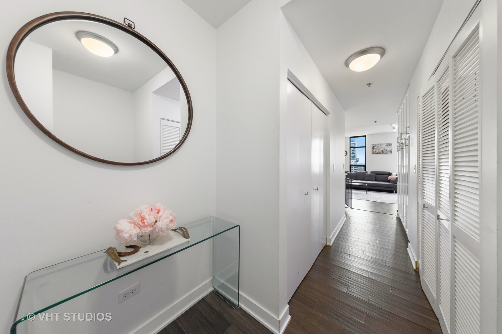 1255 South State Street, Unit 1603 Chicago, IL 60605 - Photo 2 of 21 a view of a hallway to a livingroom and toys