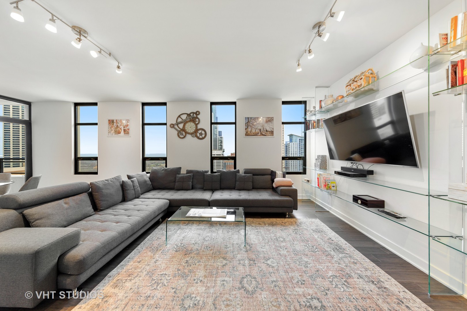 1255 South State Street, Unit 1603 Chicago, IL 60605 - Photo 3 of 21 a living room with furniture and a flat screen tv