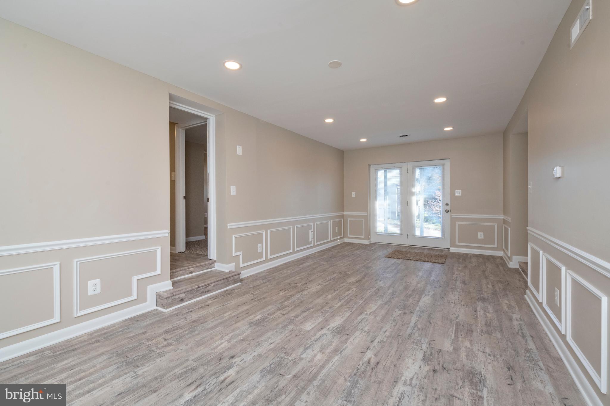 1802 Dunwoody Road Baltimore, MD 21234 - Photo 38 of 62 Recessed lighting, picture frames and chair rail