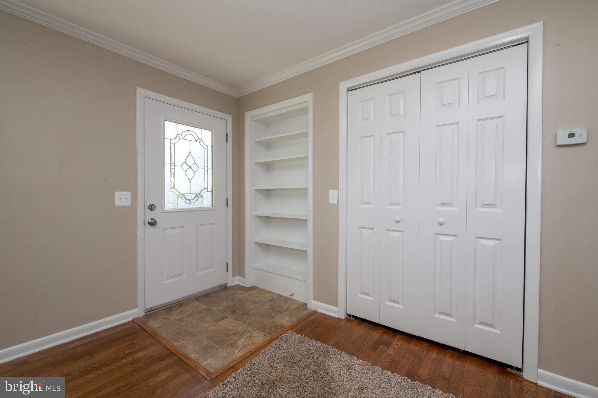 1802 Dunwoody Road Baltimore, MD 21234 - Photo 6 of 62 Foyer, coat closet and shelving