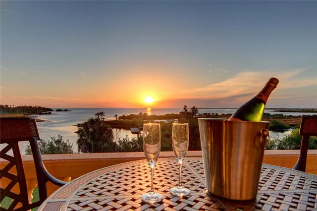 a large kitchen with a table and chairs in it