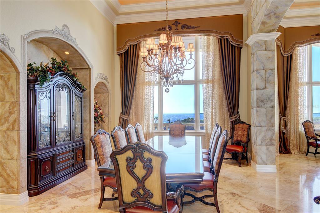 1227 Osowaw Boulevard Spring Hill, FL 34607 - Photo 19 of 96 a view of a dining room with furniture window and outside view