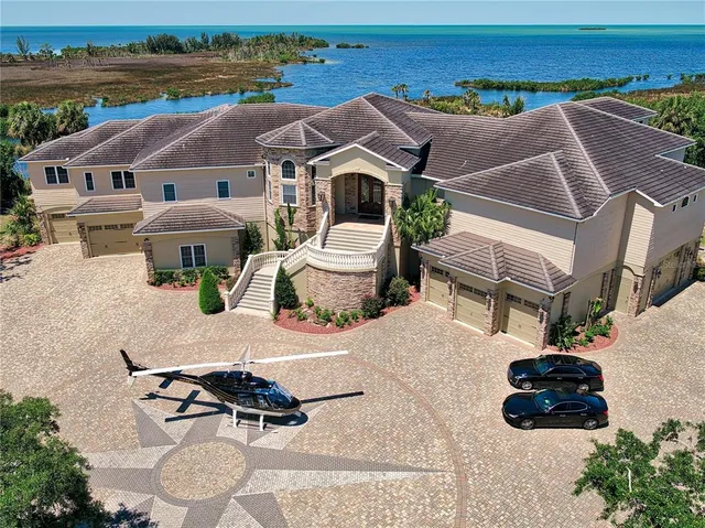 an aerial view of lake residential house with outdoor space