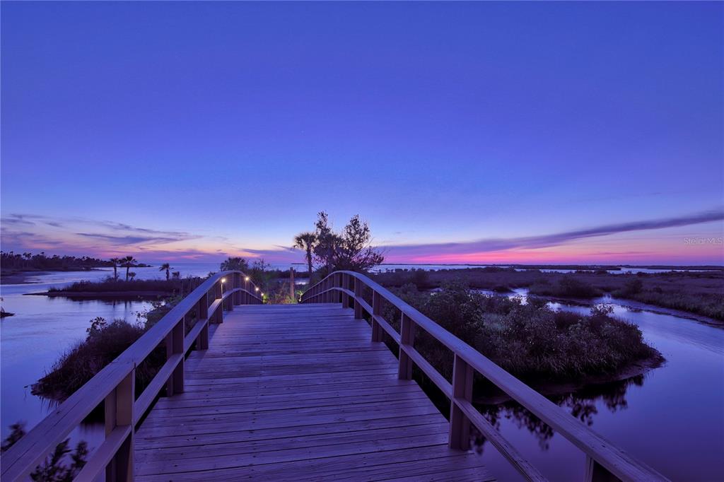 1227 Osowaw Boulevard Spring Hill, FL 34607 - Photo 78 of 96 a view of a balcony with chairs