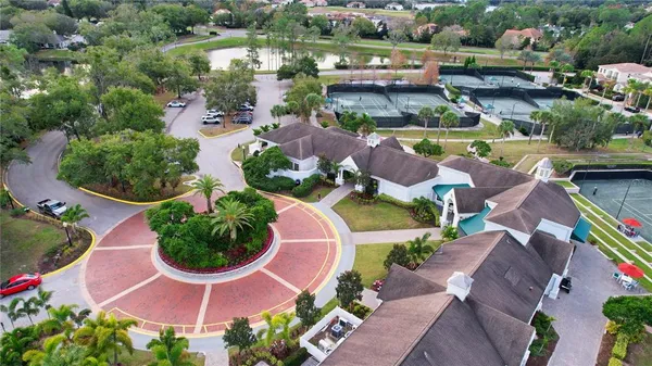 an aerial view of a swimming pool and outdoor space