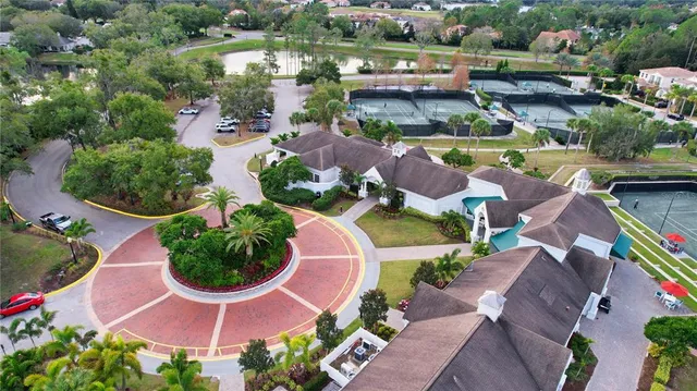 an aerial view of a swimming pool and outdoor space