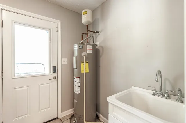 a bathroom with a bathtub and shower