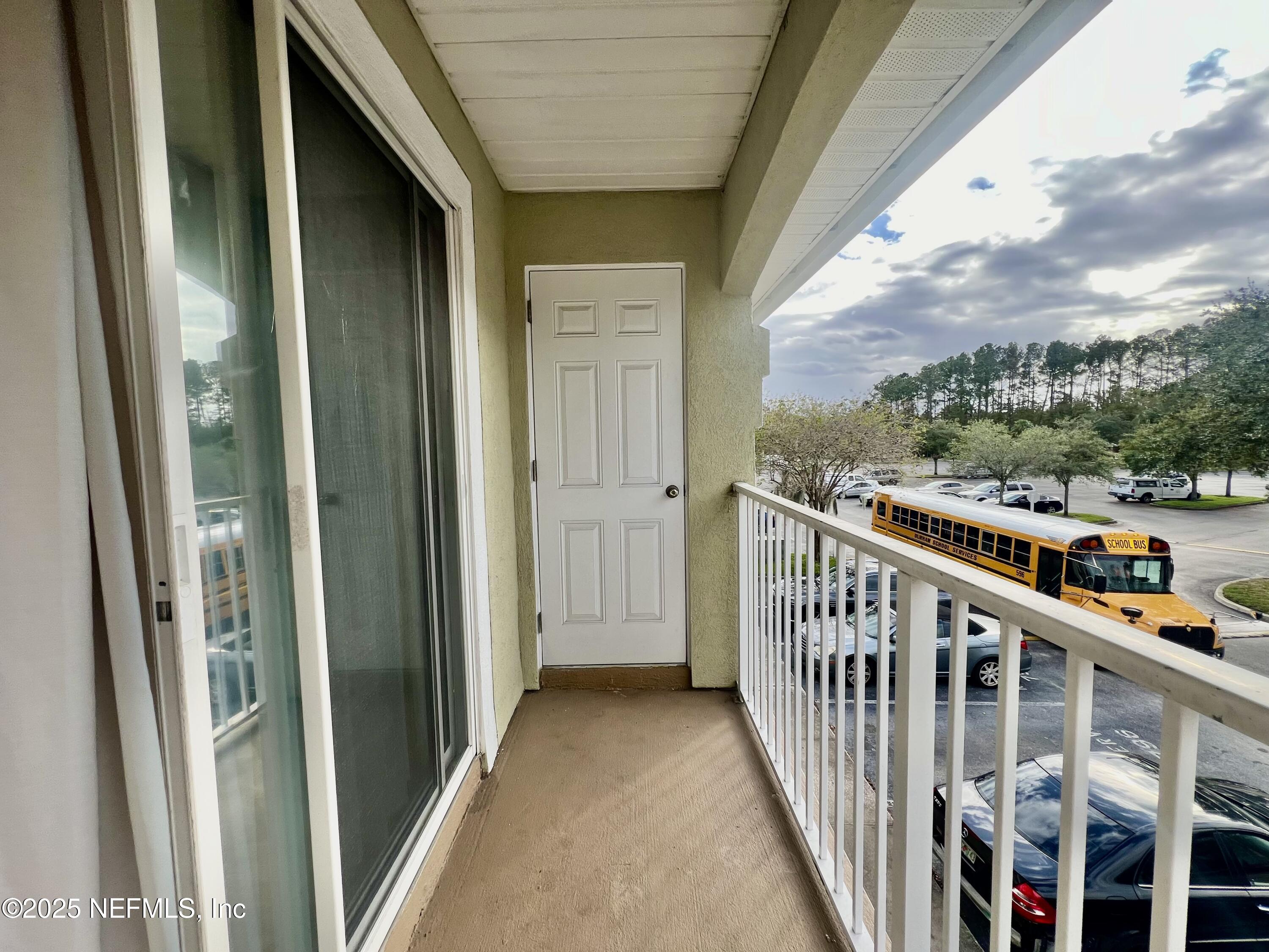 7920 Merrill Road, Unit 709 Jacksonville, FL 32277 - Photo 30 of 35 a view of a balcony with city view