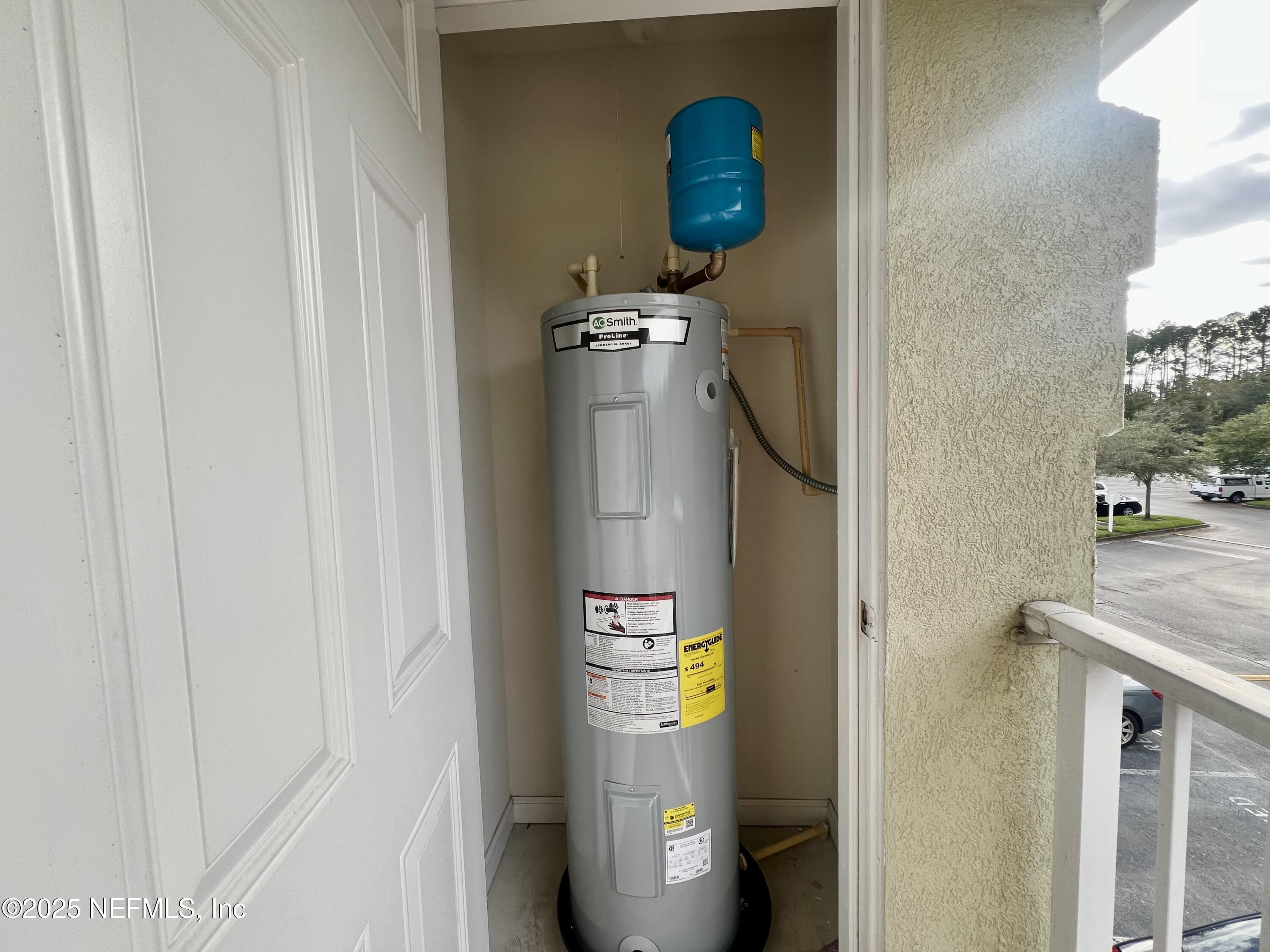 7920 Merrill Road, Unit 709 Jacksonville, FL 32277 - Photo 31 of 35 a utility room with dryer and washer