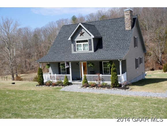 385 Gibbs Run Lane Raphine, VA 24472 - Photo 3 of 20 a backyard of a house with table and chairs