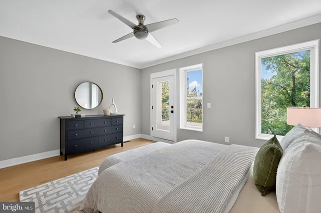 a bedroom with a bed and a walk in closet