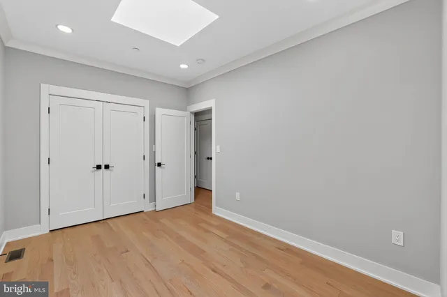 a view of a bathroom from a hallway