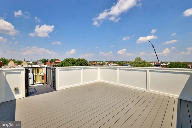 a picture of a room that has a window and sink