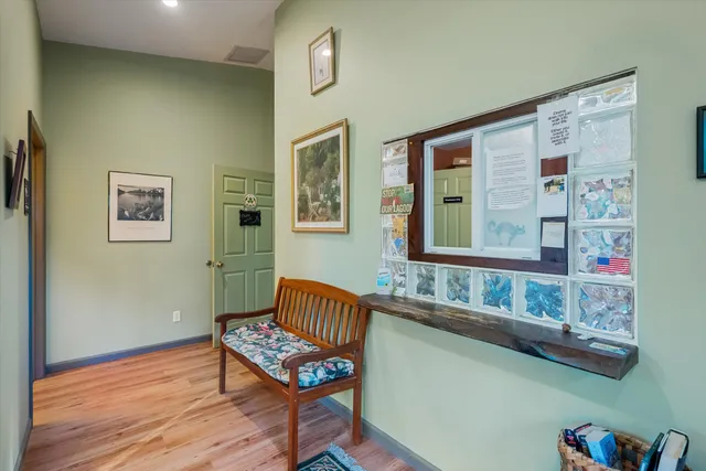 a view of a living room and dining room