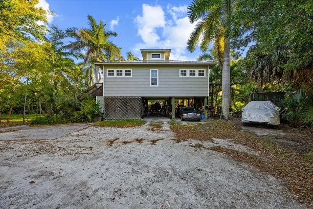 a view of a house with a street