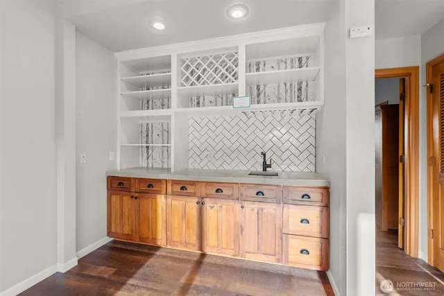 a view of cabinets and window