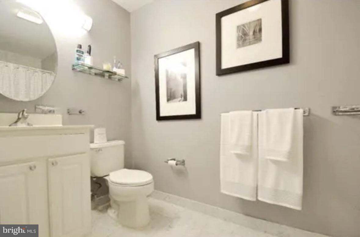 1500 Chestnut Street, Unit 4D Philadelphia, PA 19102 - Photo 17 of 26 Sleek and modern bathroom retreat.