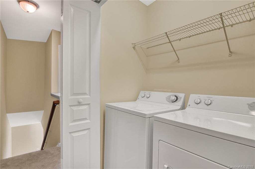 232 Dawn Mist Lane, Unit 40 Fort Mill, SC 29708 - Photo 12 of 28 a utility room with dryer and washer