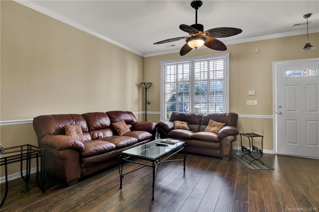 232 Dawn Mist Lane, Unit 40 Fort Mill, SC 29708 - Photo 3 of 28 a living room with furniture and a window