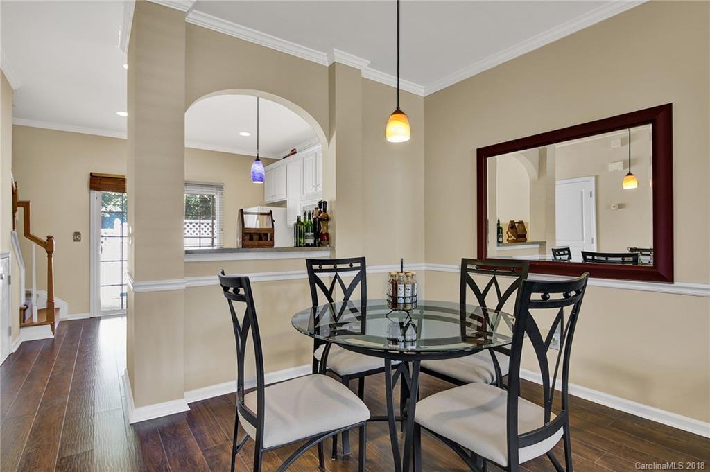232 Dawn Mist Lane, Unit 40 Fort Mill, SC 29708 - Photo 7 of 28 a view of a dining room with furniture and wooden floor