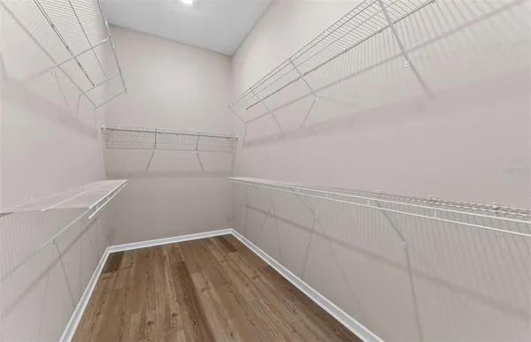 a view of a room with racks on the wall