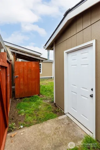 a backyard of a house with lots of green space