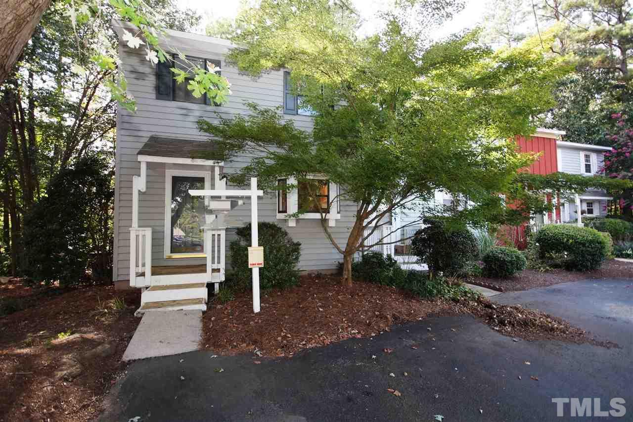 5719 Pool Side Drive Raleigh, NC 27612 - Photo 1 of 23 a view of a house with backyard and trees