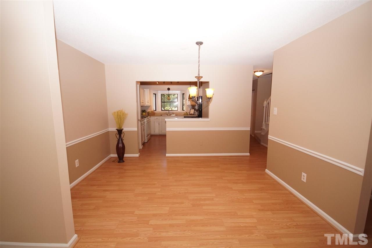 5719 Pool Side Drive Raleigh, NC 27612 - Photo 11 of 23 a view of hallway with stairs and furniture