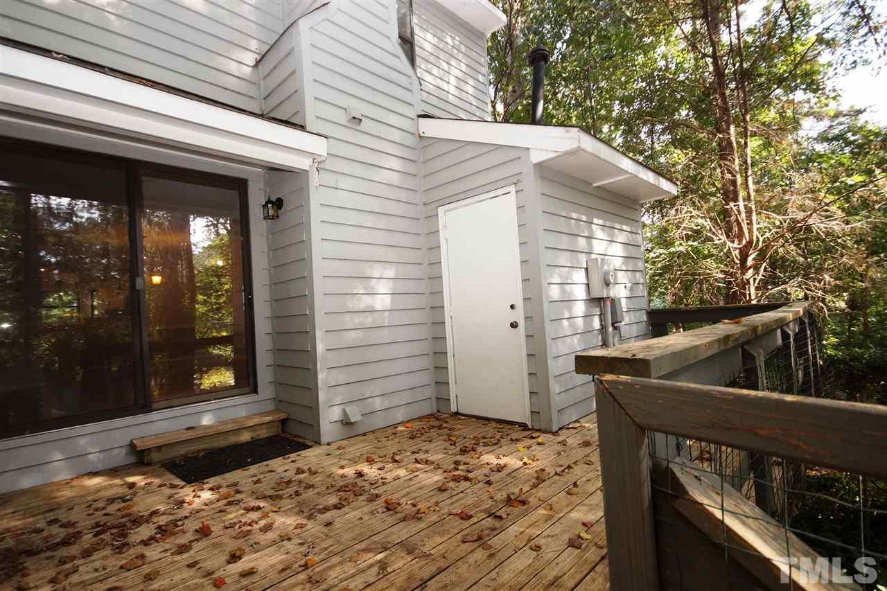 5719 Pool Side Drive Raleigh, NC 27612 - Photo 22 of 23 a view of a entryway door front of house