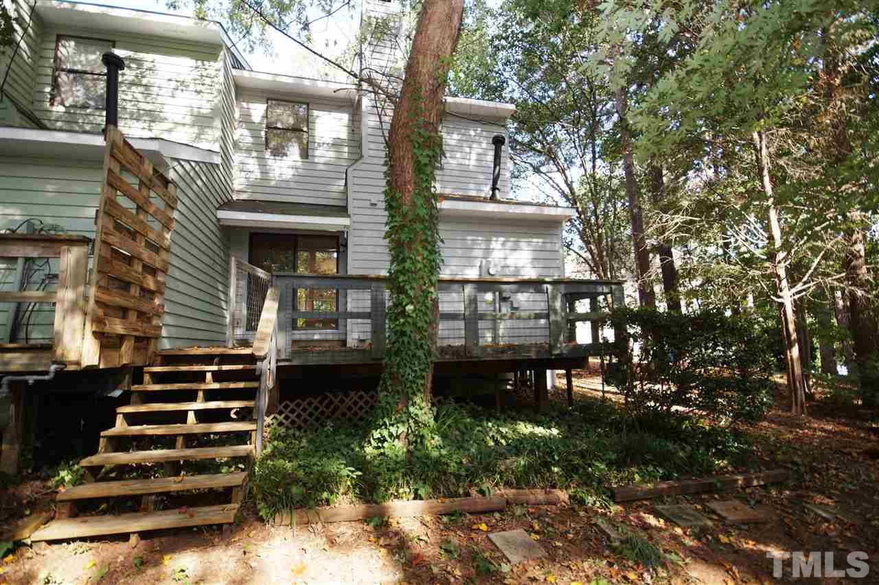 5719 Pool Side Drive Raleigh, NC 27612 - Photo 23 of 23 a front view of a house with a yard