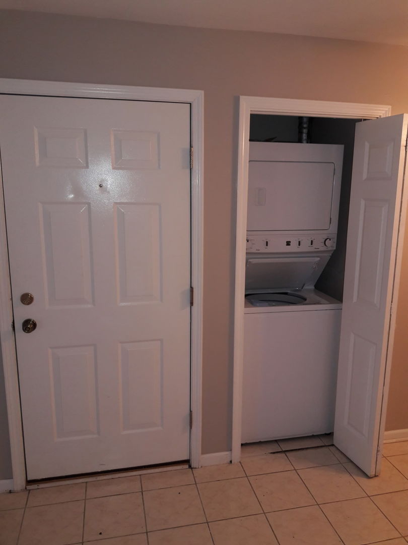 266 12th Street, Unit 3B Wheeling, IL 60090 - Photo 5 of 6 a room with a cabinet and utility room
