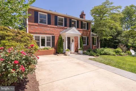 a front view of a house with yard